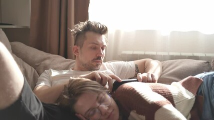 A young couple discusses home renovation and shares household tasks, capturing authentic moments of teamwork and love. Perfect for lifestyle, relationship, and DIY content