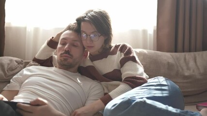 A young couple discusses home renovation and shares household tasks, capturing authentic moments of teamwork and love. Perfect for lifestyle, relationship, and DIY content