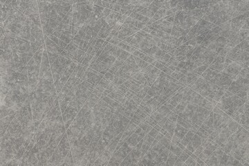 Fototapeta premium Used concrete flooring showing signs of wear and scratches