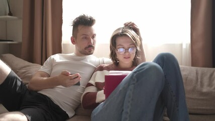 A young couple discusses home renovation and shares household tasks, capturing authentic moments of teamwork and love. Perfect for lifestyle, relationship, and DIY content