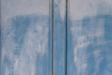 Faded Blue Wooden Panels Revealing Rustic Character and Textured Layers Old Weathered Wood Surface...