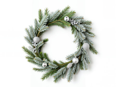 Christmas wreath decorated with silver ornaments and greenery isolated white background  - Powered by Adobe