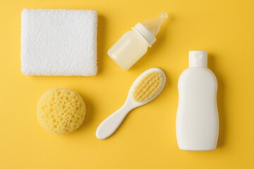 Essential hygiene tools for newborn and baby care on a vibrant yellow background