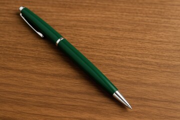 A writing instrument resting on a surface
