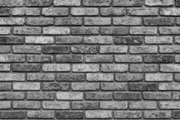 Obraz premium Monochrome brick wall section as backdrop