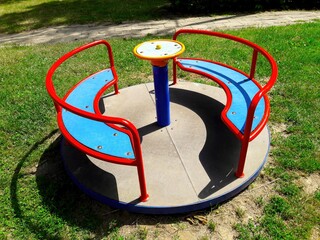 A Colorful and Engaging Playground MerryGoRound Designed Specifically for Kids to Enjoy
