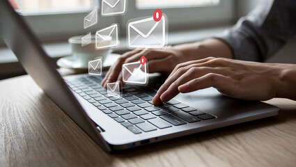 Typing on Laptop with Email Notification Overlays Receiving Messages