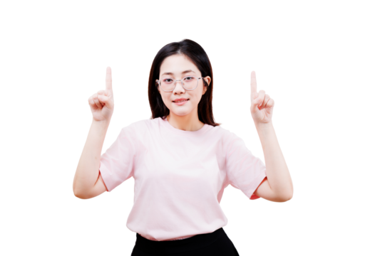 Asian young beautiful woman wearing glasses and a pink shirt point both index fingers upward with a confident expression.