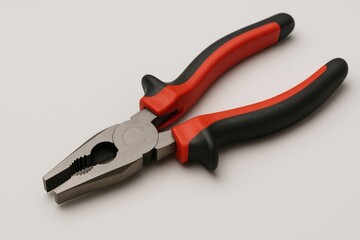 Obraz premium Red and black pliers displayed against a background