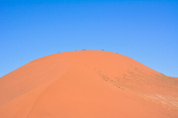 View of the great sand dune near the speculative desert under a bright cloudy sky. Arid climate and global warming