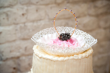 Chic dessert display, detailed. A stunning dessert with lace-like details and pastel colors, ideal...