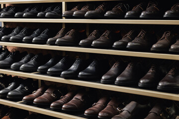 Fashion leather mens shoes in store, dark background