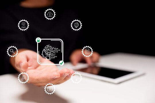 A person holding a digital interface with AI and technology icons, symbolizing innovation, connectivity, and futuristic digital solutions.