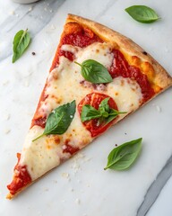 A slice of delicious pizza with fresh basil isolated on white background marble