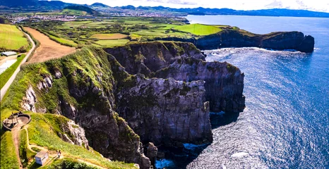 Fotobehang Azores , Portugal. amazing Sao Miguel island. aerial drone panorama of miradouro do Cintrao with impressive rugged rocks and ocean in norther part © Freesurf