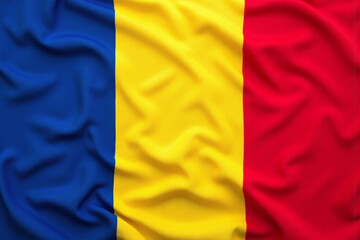 the flag of romania is waving in the wind