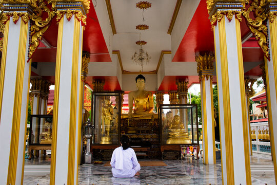 Thai women ordained as a nun for observe religious practice dharma and meditate respect praying buddha and blessing holy mystery worship at Wat Kositaram temple on May 27, 2020 in Chai Nat, Thailand