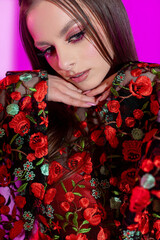 An Exquisite and Glamorous Fashion Portrait Featuring Stunning Floral Design and Sparkling Makeup