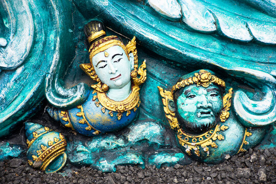Carved sculpture art animal of himmapan and creatures mythical legend for thai people travelers travel visit respect praying holy mystery in Wat Phra Kaew temple at Chainat city in Chai Nat, Thailand