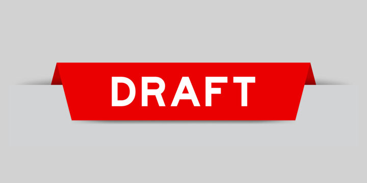 Red color inserted label with word draft on gray background