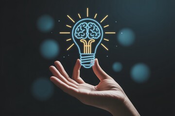 Hand holding glowing light bulb with brain inside, creative idea innovation and thinking concept.
