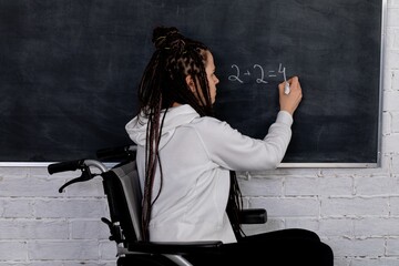 An Innovative Teacher in the Classroom Who Uses a Wheelchair to Effectively Teach Students