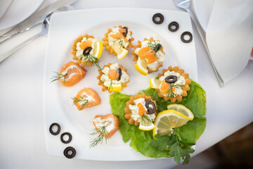 Delightful and Beautifully Elegant Seafood Appetizers Perfectly Arranged on a White Plate