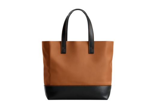 Stylish brown and black tote bag, isolated on black background.