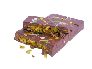 Dubai chocolate bar with pistachio and milk filling isolated on white background, chocolate trend,...