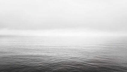 Fototapeta premium Gray expanse of a hazy ocean