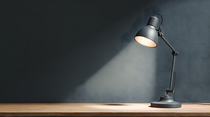 Modern Desk Lamp Illuminating a Dark Work Space with Warm Light