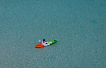 Happy holiday with asian woman traveller exploring calm tropical bay ,Travel and Active Lifestyle concept