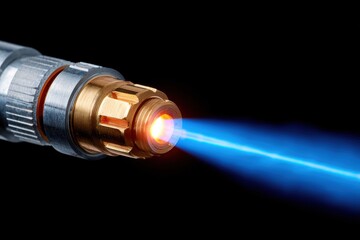A close-up of a plasma cutting torch emitting a bright blue plasma arc against a black background