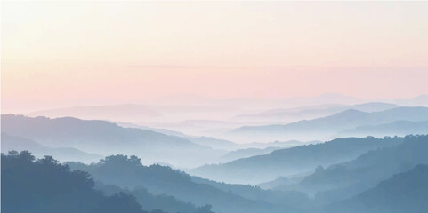 Misty mountain landscape in the early morning light with fog covering the hills and trees