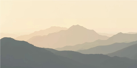 A stunning alpine scene emerges, with peaks covered in clouds and mist and illuminated by the gentle tones of dawn or dusk.