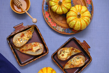 autumn still life with baked pears and cheese