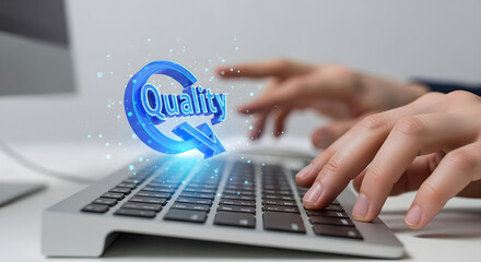 Hands typing on a keyboard with a blue quality graphic overlaying the keyboard on transparent background