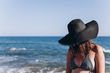 Woman enjoying a sunny day at the beach