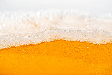 Close up bright orange Oil or beer splash texture and nature waves, Beautiful waves curve and...