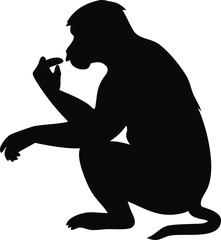 Silhouette of a thoughtful monkey sitting and pondering with finger raised in contemplation