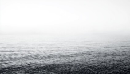 Calm, gray sea, hazy horizon