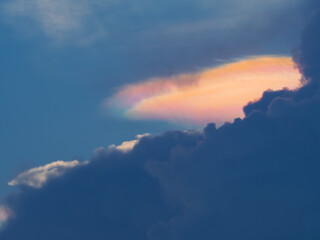 The clouds in the sunset sky are beautiful.