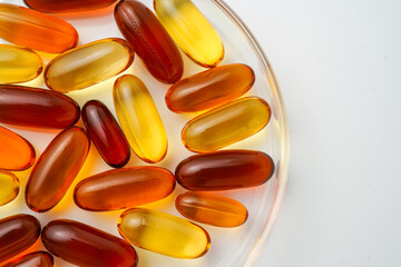 Vitamins capsules, fish oil, soft gels, supplements, omega 3, omega 9, vitamin D, vitamin E