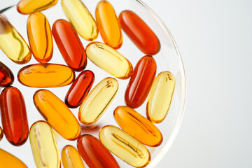 Vitamins capsules, fish oil, soft gels, supplements, omega 3, omega 9, vitamin D, vitamin E