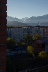 Apartment building with mountains in the background