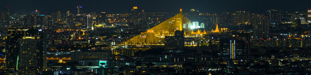 city interchange closeup at night, Aerial view of road interchange or highway intersection with busy urban traffic speeding on the road