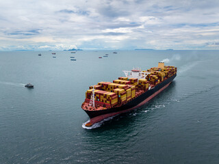 logistic cargo container ship sailing in sea to import export goods and distributing products to dealer and consumers across worldwide,