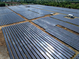 Aerial view of solar panel and power station with energy storage.