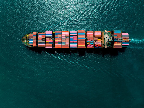 shipping logistic cargo container ship import export goods and distributing products to dealer and consumers across worldwide by container ship business and industry transportation - Powered by Adobe