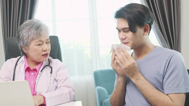 Female doctor provides treatment and diagnosis for male patient who is sick and has runny nose in order to examine him and request medical certificate in the clinic : Man takes leave to see a doctor.